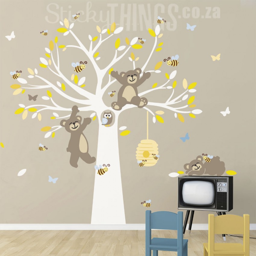 This Bears and the Bees Tree Wall Art is a large tree with leaves, 3 bears, an owl, a beehive and lots of bees.