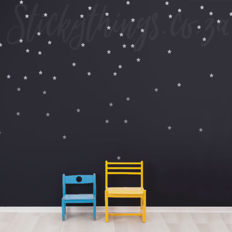 Silver Shooting Stars Pattern Wall Decals on a dark wall