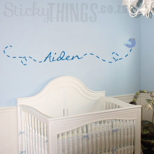 The Personalized Name Decal is your custom name wall sticker integrated into the flight path of a cute bird decal.