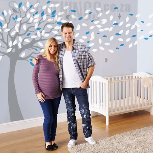 The Blowing Leaves Tree Wall Decal is a giant tree with hundreds of leaves blowing around the baby room