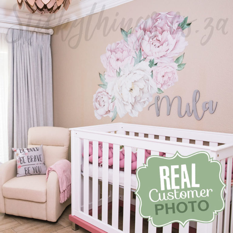 The set of pink and cream peony floral Wall Stickers in a Nursery