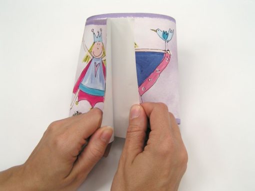 Hand showing the Peel and Stick Princess Fairy Purple Border