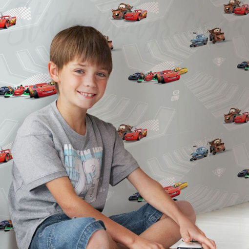 Young boy with the Disney Cars Wallpaper