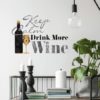 Keep Calm and Drink More Wine Quote Wall Decal in a dining room