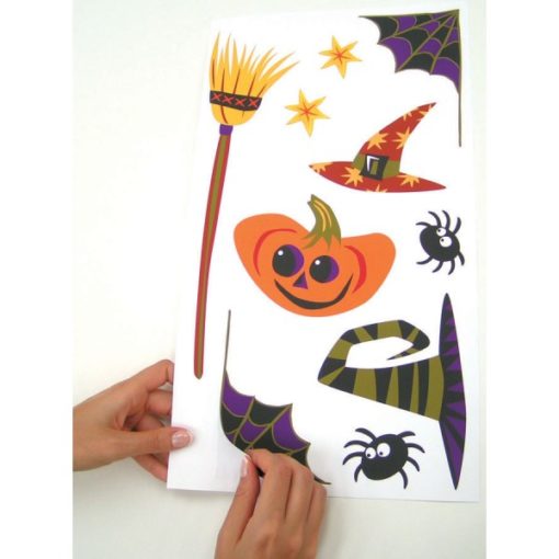 Hand showing how easy the Peel and Stick Halloween Sticker is