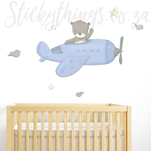 The Bear-o-Plane Wall Sticker above a crib in a nursery