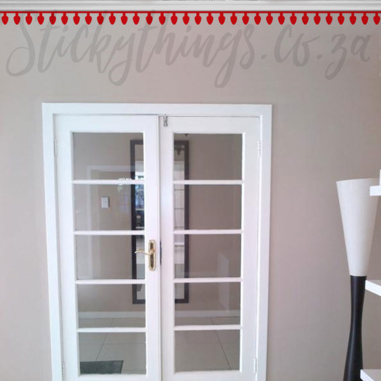 Red Christmas Bulb Wall Stickers installed along the ceiling cornice