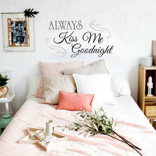 Kiss Wall Art Decal above a bed in a bedroom