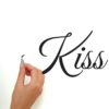 So easy to peel and stick the Always Kiss Me Wall Art