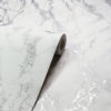 Showing the metallic shimmer of the Silver Marble Wallpaper