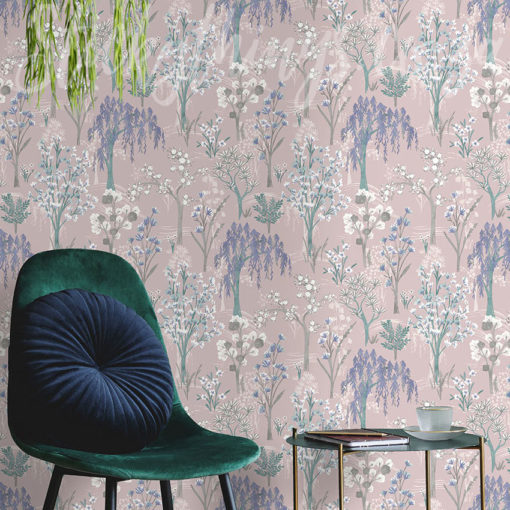 Dusty Pink Trees Wallpaper on the wall behind a chair
