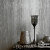 Grey Plaster Effect Wallpaper on all behind a table