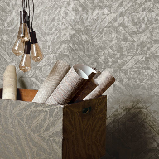 Grey Geometric Plaster Wallpaper on a wall behind a box of wallpaper rolls