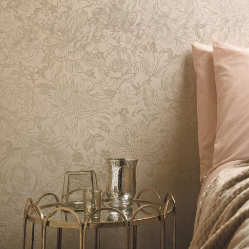 Pink and Gold Floral Wallpaper on bedroom wall behind a small bedside table