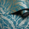 A roll of Teal Textured Leaves Wallpaper
