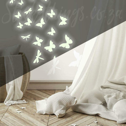 Dragonfly and Butterfly Decals on a bedroom wall glowing in the dark part.