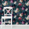 Handpainted Navy Roses Wallpaper on a wall behind a white chair