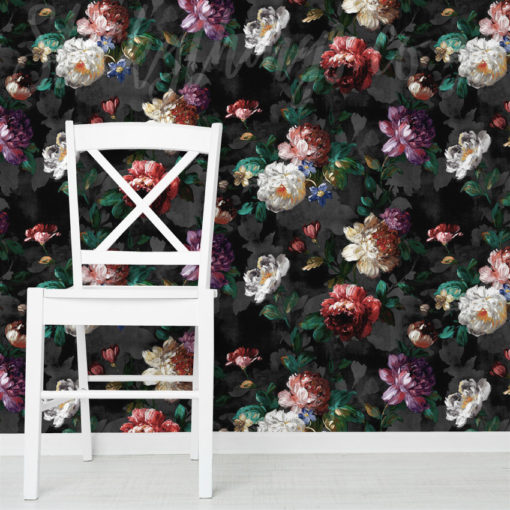 Handpainted Roses Black Wallpaper on a wall behind a white chair