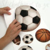A sheet of Peel and Stick All Star Sports Wall Decals
