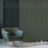 Soft Metallic Gold Fabric Wallpaper on wall next to a chair