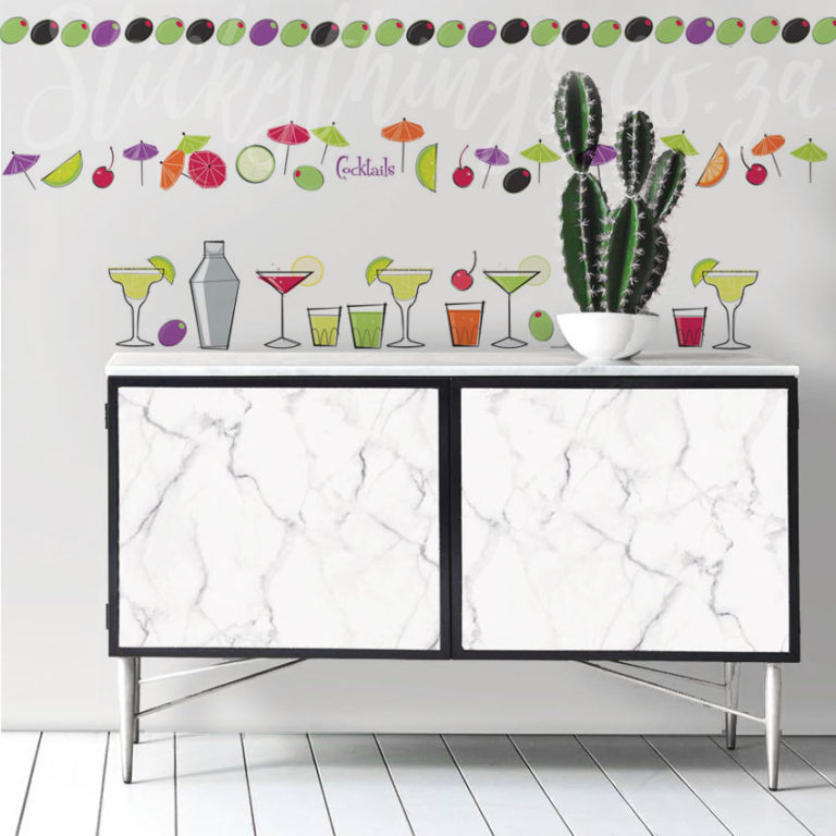 Cocktail Wall Stickers on a wall above a small cabinet
