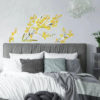 Watercolour Daffodils Wall Sticker on a bedroom wall above a headboard