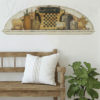Giant Arch Wall Decal on a wall above a wooden bench in an entrance hall