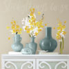 Yellow Flower Arrangement Wall Art with vases on a table