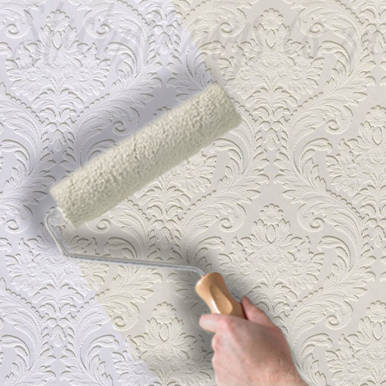 Heavy Damask Embossed Wallpaper being painted
