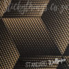 Close up of the metallic embossed shapes of the Black and Gold Hexagon Wallpaper