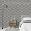 Curved Grey Trellis Wallpaper on a bedroom wall