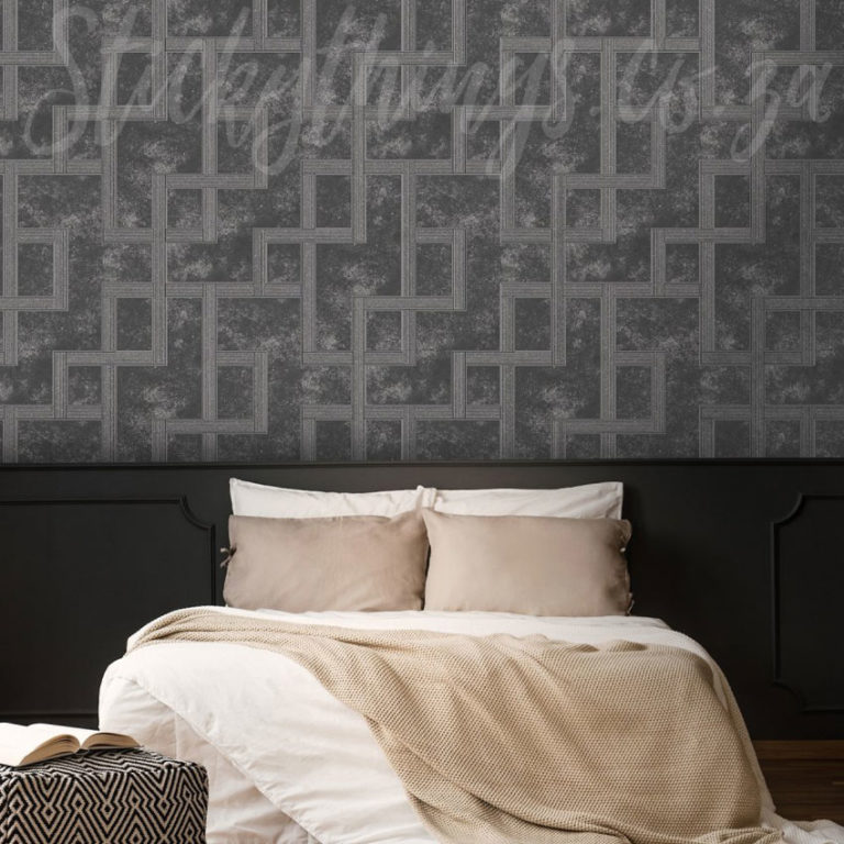 Greek Key Charcoal Wallpaper on a bedroom wall