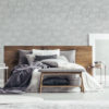 Grey Dandelion Like Wallpaper on a bedroom wall