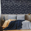 Navy Dandelion Like Wallpaper on a bedroom wall