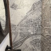 The Antique Map Wallpaper Mural installed around a corner in a bathroom