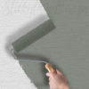 Paintable Woven Fabric Wallpaper on a wall being painted