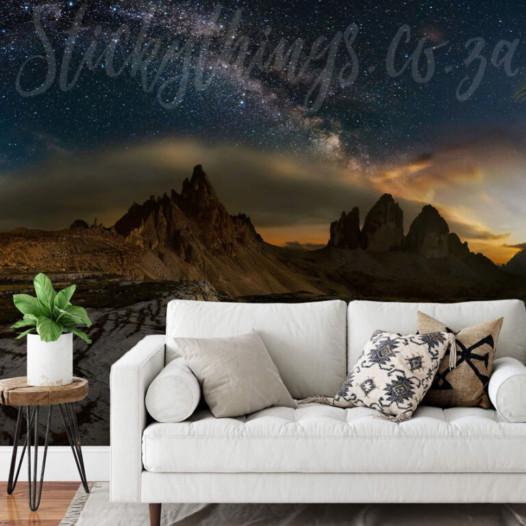 Starry Night Sky Wallpaper Mural on a living room wall