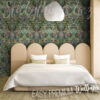 Teal Tropical Botanical Wallpaper on a wall