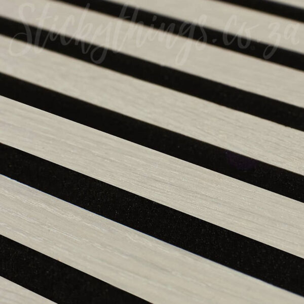 The Birch Akhupanels have a whitewashed look and black slat inners and a black felt backing